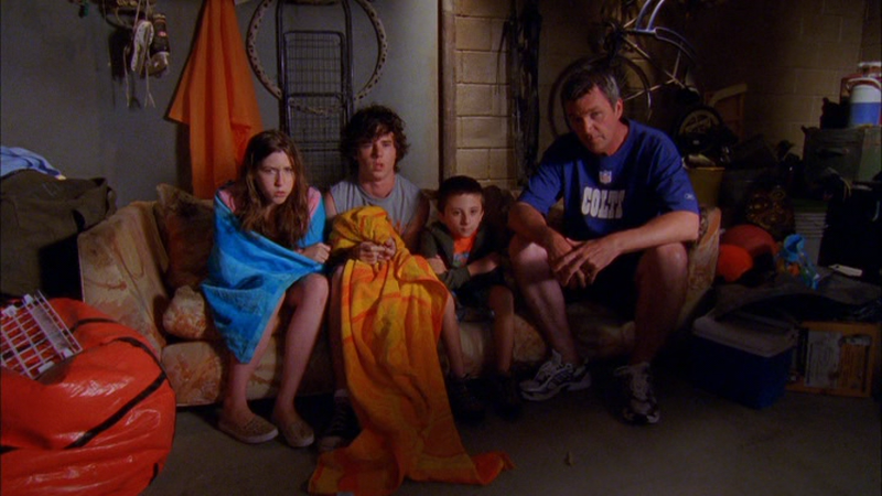 Eden Sher, Charlie McDermott, Atticus Shaffer, and Neil Flynn in “The Cheerleader”